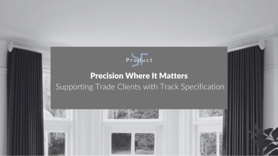 The Silent Gliss 7620 bent to perfection around the bay widow - dark curtains hanging either side